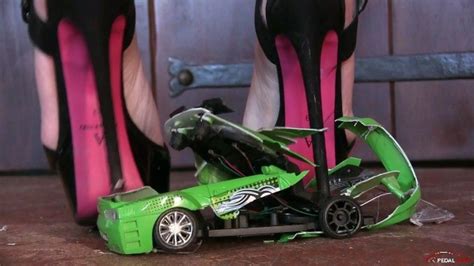 252 miss iris crushing toy cars under her sexy heels pedal vamp