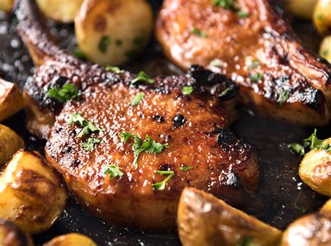 Bake the pork chops, uncovered, for about 15 minutes until the meat is just firm when lightly pressed. Oven Baked Pork Chops with Potatoes | Recipe | Baked pork ...