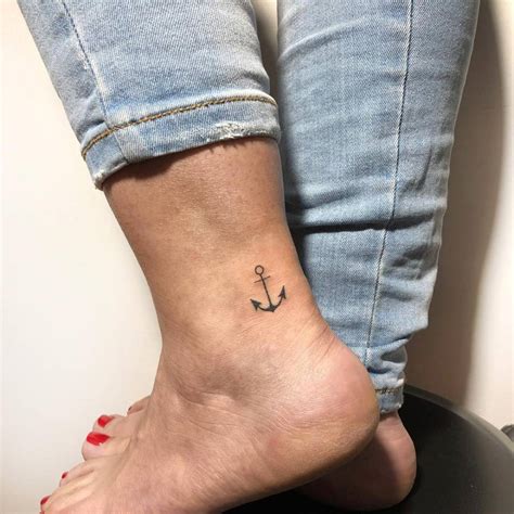 minimalist anchor tattoo on the ankle
