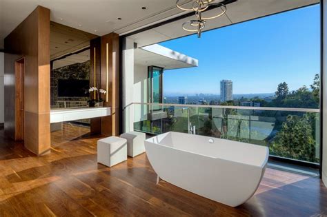 After he taking the tiles off, there were more damage with the wood. Sophisticated Hollywood Hills Home with Dramatic Views of ...