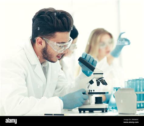 Close Up Male Scientist Conducting Research In The Laboratory Stock