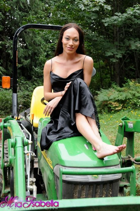 Transsexual Sweetie Mia Isabella Posing On A Tractor Porn Pictures Xxx Photos Sex Images