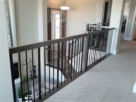 This is actually the part of the stair between the bottom rail and also the handrail. Metal Baluster | Custom Stairs | Artistic Stairs