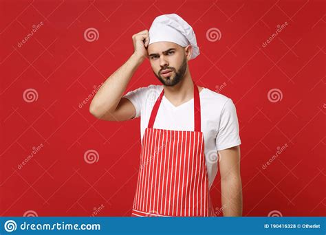 Exhausted Young Bearded Male Chef Cook Baker Man In Striped Apron White T Shirt Toque Chefs Hat