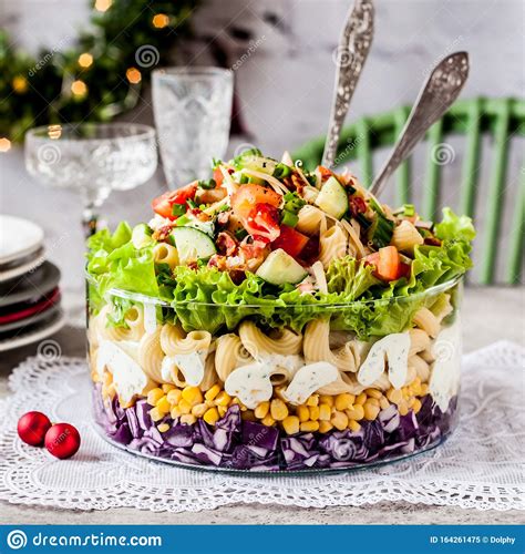 Make this easy shrimp and pasta salad for your next picnic or potluck! Christmas Pasta Salad stock image. Image of concrete - 164261475