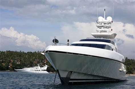 luxury superyachts anchored in the lovely phuket yacht charter location — yacht charter
