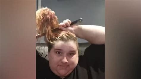 Watch Woman Attempts To Cut Her Own Hair With A Bread Knife Goes As