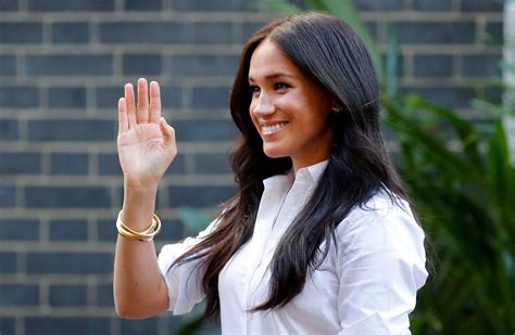 Meghan Markle Steps Out Wearing Pieces From Her Charity Clothing Line Fame10