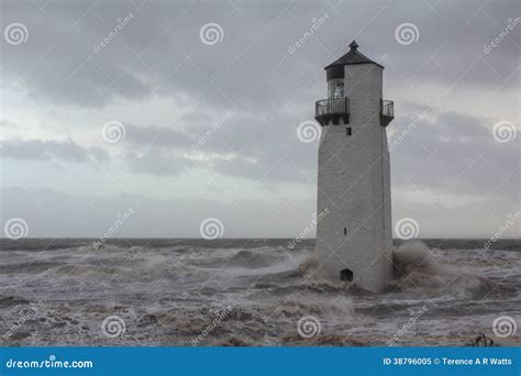 Southerness Lighthouse In Stormy Seas Stock Image Image Of