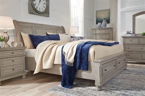 Lettner King Sleigh Bed With 2 Storage Drawers Ashley