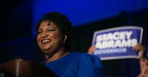 stacey abrams slammed georgia s voter id law and said her opponent is trying to suppress votes