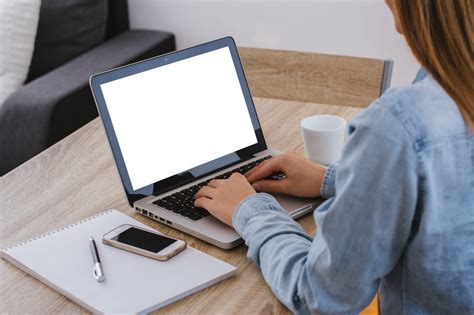 Woman Typing On Notebook With Blank Screen With Copy Space