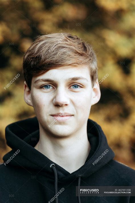 Portrait Of Teenage Boy Standing Outdoors — Close Up Shallow Depth