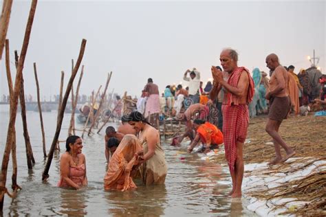 Hindu Devotees Come To Confluence Of The Ganges River For Holy Dip During The Festival Kumbh