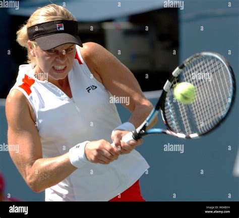 Belgiums Kim Clijsters Hits A Forehand Return During The Singles Final