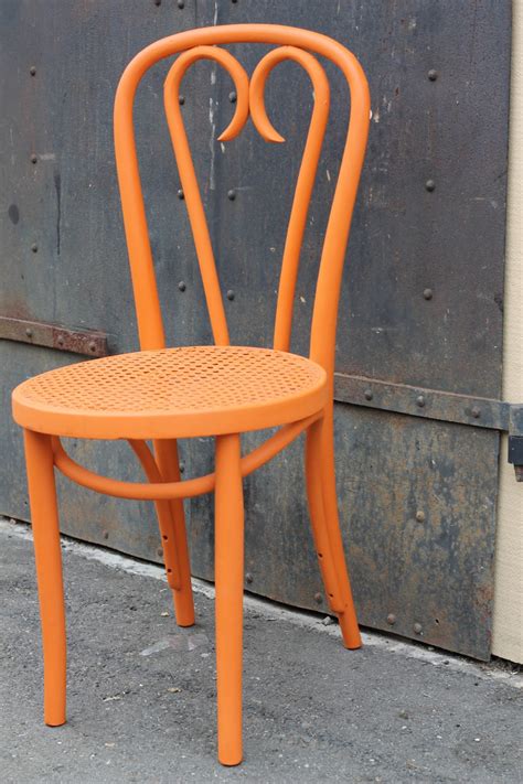 Great savings & free delivery / collection on many items. Walrus: Orange Bentwood Cafe Chair with Caned Seat