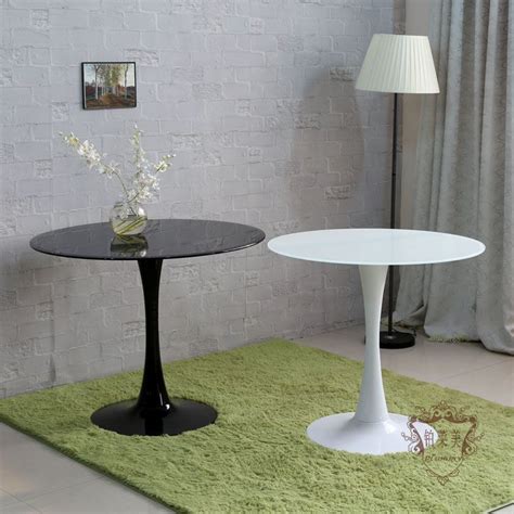 He thought all those legs of conventional tables and chairs visually. Modern Ikea Tulip Table - HomesFeed