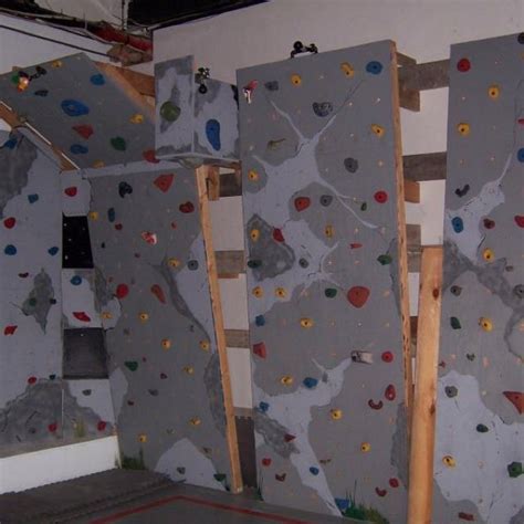Home Made Rock Climbing Wall Red Wall With Black And Grey Rocks Rock