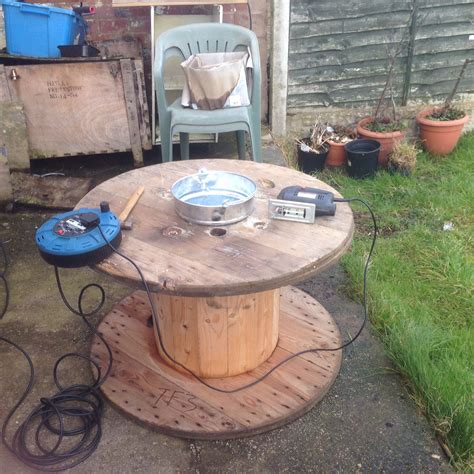 Repurposed Electric Wire Reel On Galvanised Bucket For Fire And One