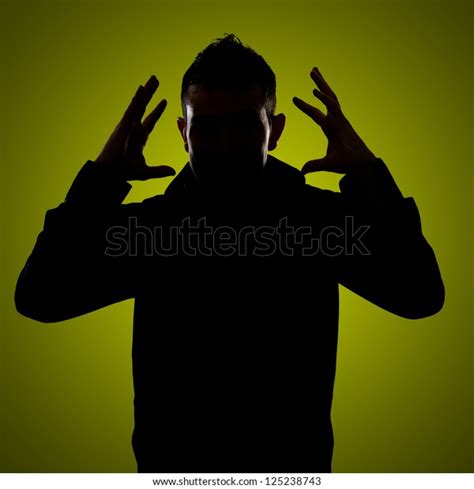 Silhouette Frustrated Man Isolated On Green Stock Photo 125238743