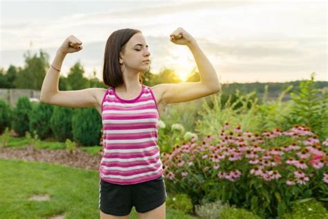 Teen Flexing Muscles Stock Photos Pictures And Royalty Free