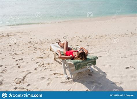 Full Length Photo Of Beautiful Lady Lying Lounge Chair Azure Blue Water