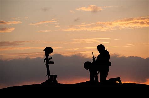 Royalty Free Kneeling Soldier Pictures Images And Stock Photos Istock