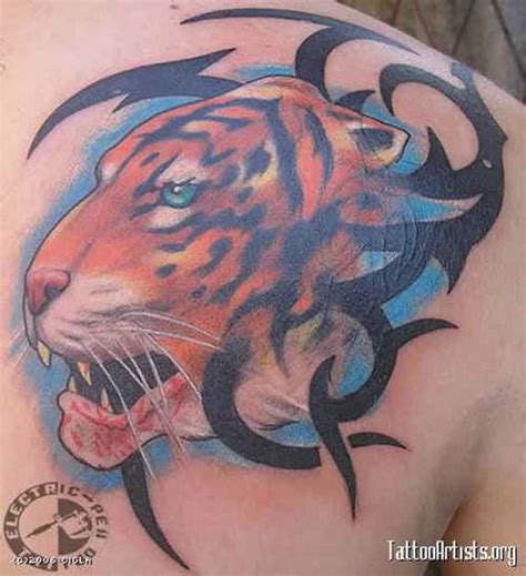 This tiger tattoo takes up the entire back and gives a real homage to the sheer size of the tiger. 140+ Best Tiger Tattoos Designs for Men & Women
