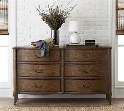 This dresser with mirror is crafted from solid wood and wood veneer frame structure finished in brown cherry for stability and longer use. Calistoga Extra-Wide Dresser | Pottery Barn Australia