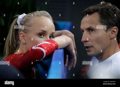Us Gymnast Nastia Liukin Speaks With Her Father And Coach Valeri Liukin During The Gymnastics