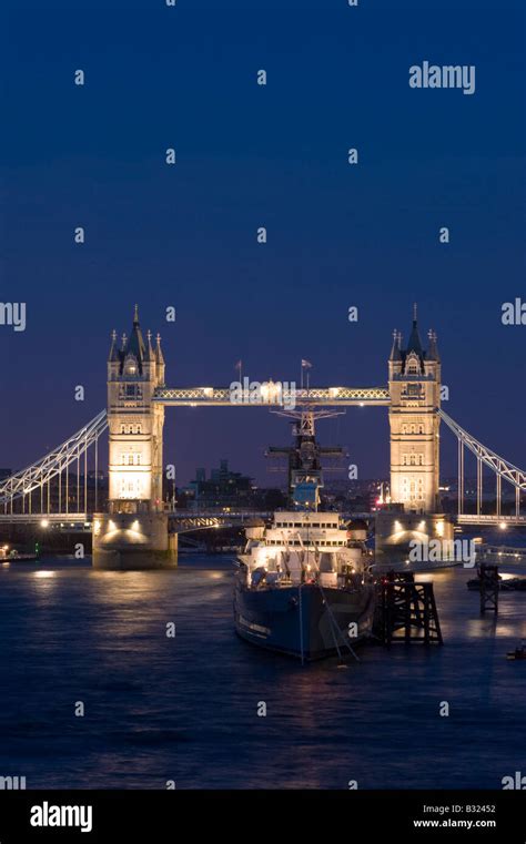 Tower Bridge Over Thames River At Night London United Kingdom Stock