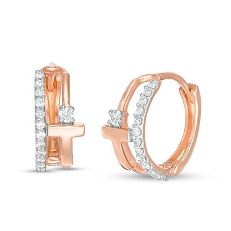 Dainty and darling, these diamond cross earrings are a thoughtful communion or confirmation gift for her. 1/5 CT. T.W. Diamond Cross Split Hoop Earrings in 10K Rose Gold | Zales