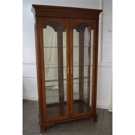 Beautiful hand built solid mahogany curio cabinet display case with two glass shelves and (led) lighted interior free standing or wall hung. Jasper Traditional Oak Lighted Display Curio Cabinet ...