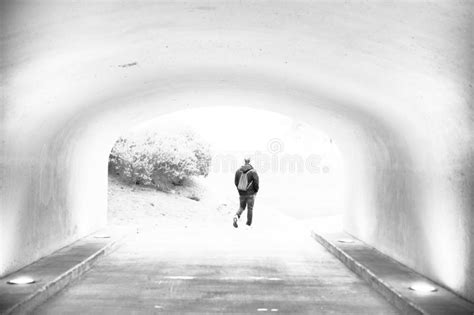 Man Walking Through A Tunnel Stock Photo Image Of Life Journey