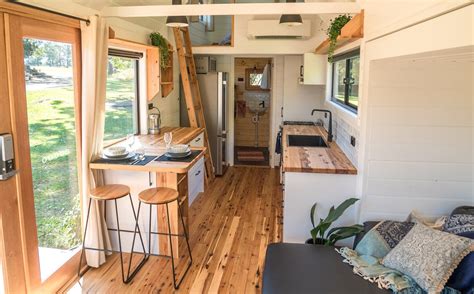 Tiny home on wheels built in 2018 by aussie tiny houses. Sojourner by Häuslein Tiny House Co. With Slide-Out Living ...
