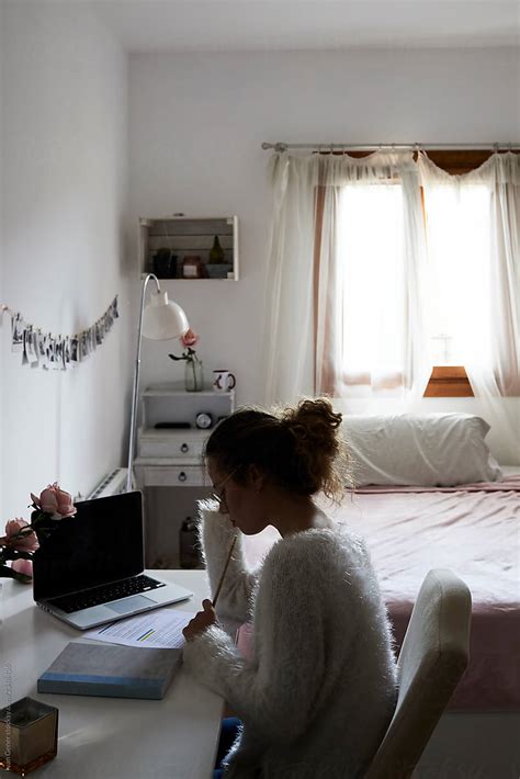 Student Preparing Exams In Bedroom Del Colaborador De Stocksy Ivan