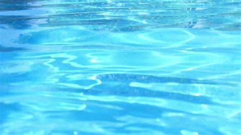 Swimming Pool Water Surface With Sparkling Light Reflections Stock