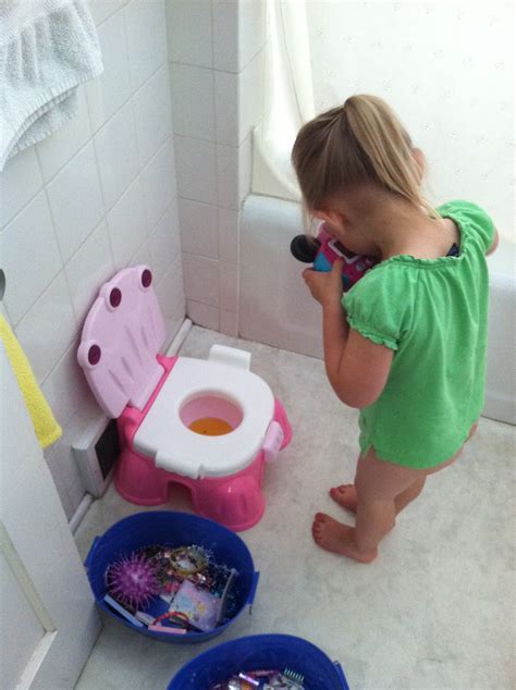 Potty training success hinges on physical and emotional readiness, not a specific age. Potty Training...SUCCESS!!! | shoeper-mom