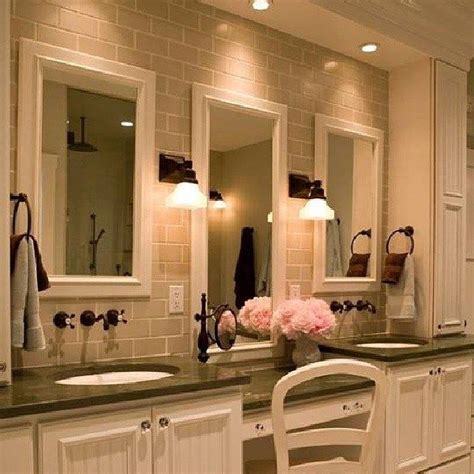 Following a few simple safety guidelines, a diy homeowner can easily replace a to do so, it helps to have an assistant hold the fixture in place on the ceiling while you measure the distance and adjust the chain accordingly. Update Your Bathroom With Contemporary Bathroom Light ...