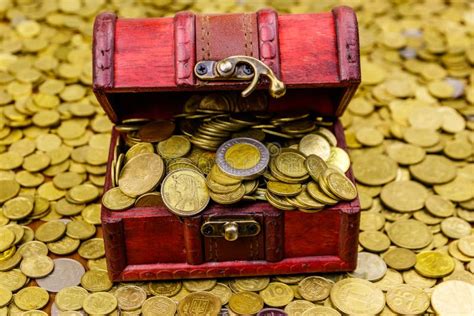 Vintage Treasure Chest Full Of Gold Coins On Background Of Golden Coins