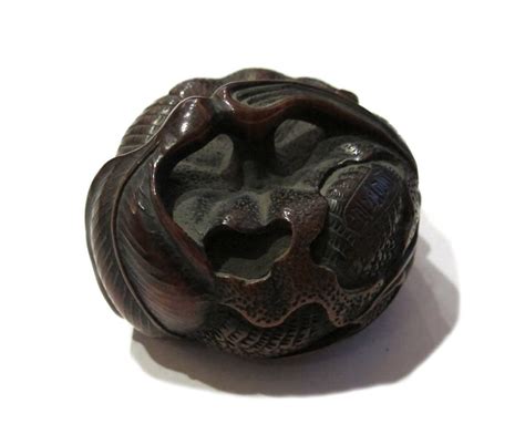 Where netsuke differs from other miniature sculpture is that they are essentially functional objects and therefore have certain constraints placed on their design. Wood netsuke - Dragon coiled in an orange | Art from China ...