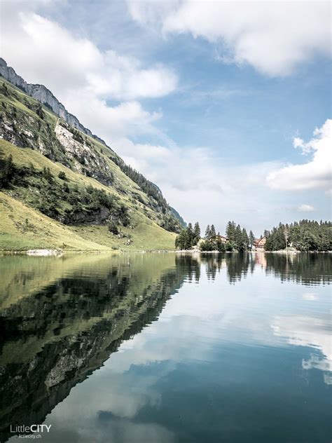 Seealpsee, a lake in the canton of appenzell in switzerland, can be reached via a hike from ebenalp or wasserauen. Alpstein: Ein Tagesausflug zum wunderschönen Seealpsee ...