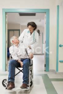 Doctor Helping A Patient Stock Photo Royalty Free Freeimages