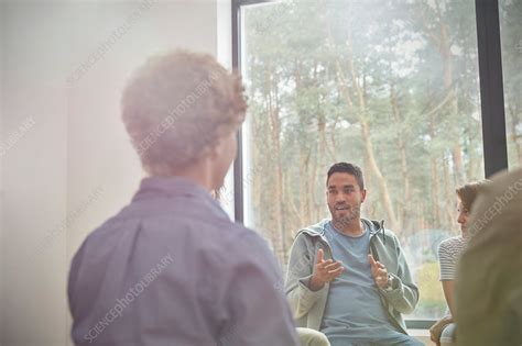 Man Talking And Gesturing In Group Therapy Session Stock Image F020 6565 Science Photo Library