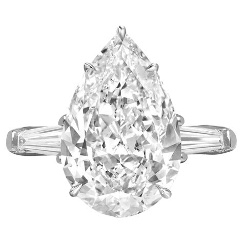 Gia Certified 379cts Pear Shape Diamond Set In Platinum W 2 Tapper