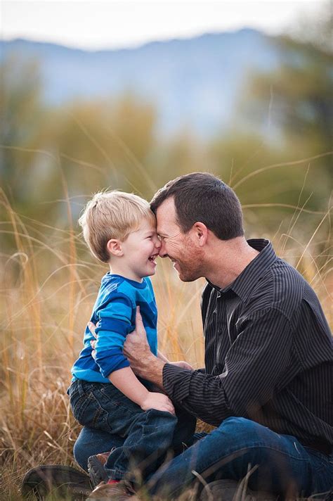 31 photos of men holding their tots that ll make your ovaries explode father son photos