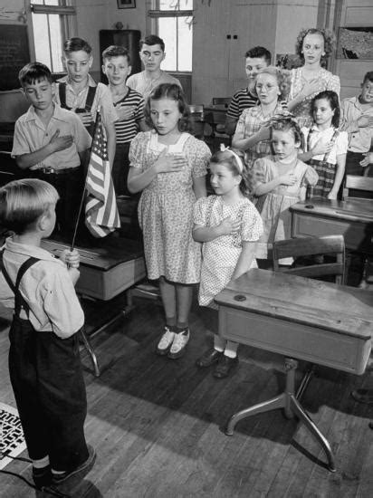 Welcome to our youtube channel for teachers, parents and kids! 'Children Reciting the Pledge of Allegiance as a Boy Holds the Us Flag in their Classroom ...