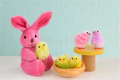A Plush Bunny And Colorful Easter Chicks In Baskets Stock Image Image