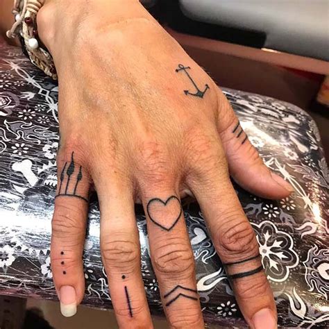Small tattoos with symbols and meanings. 21 Small Hand Tattoos and Ideas for Women | Page 2 of 2 ...