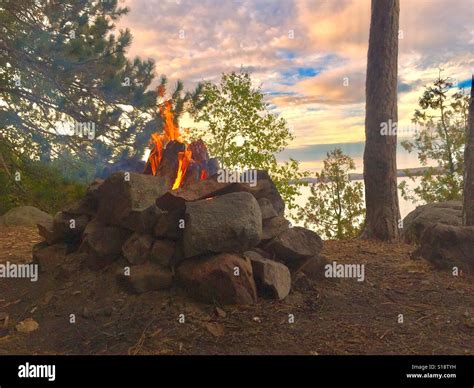 Campfire At Lakefront Portrait Stock Photo Alamy